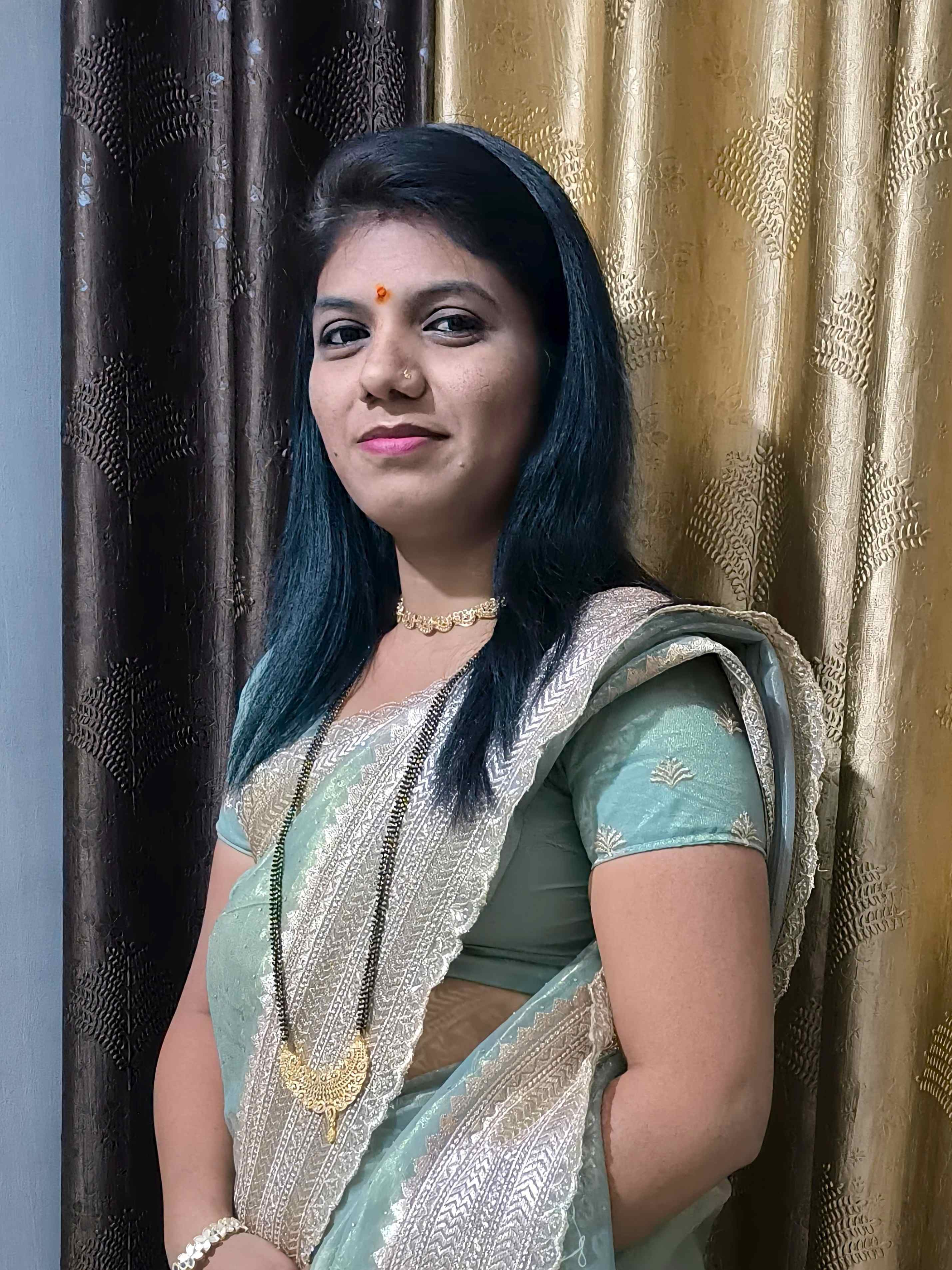 Mrs. Pooja Anil Kanade - Director
